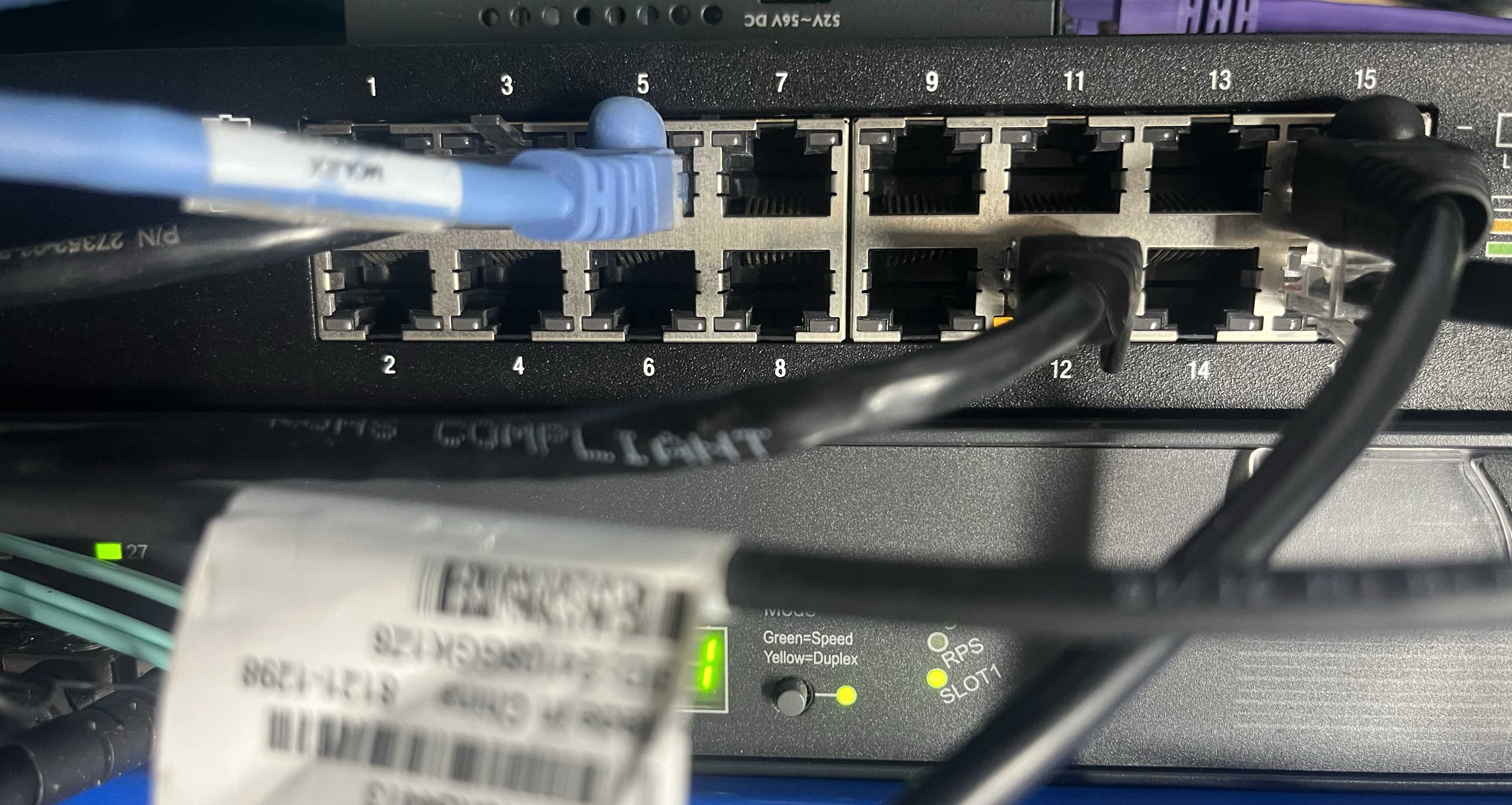 Network switches, ethernet and fibre cabling illustrate the infrastructure foundation beneath many regional security roles.