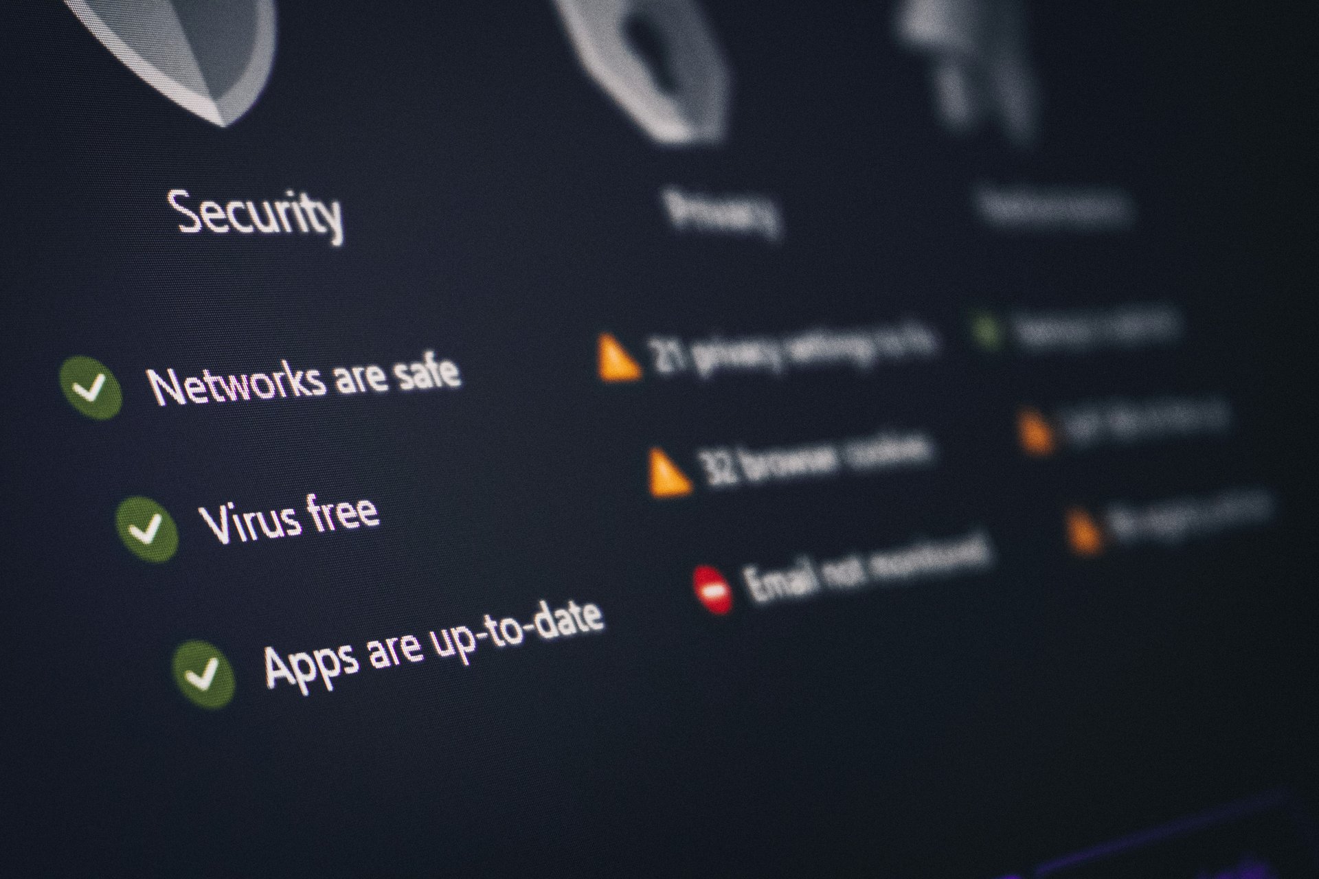 A security dashboard showing network, application and threat status indicators.